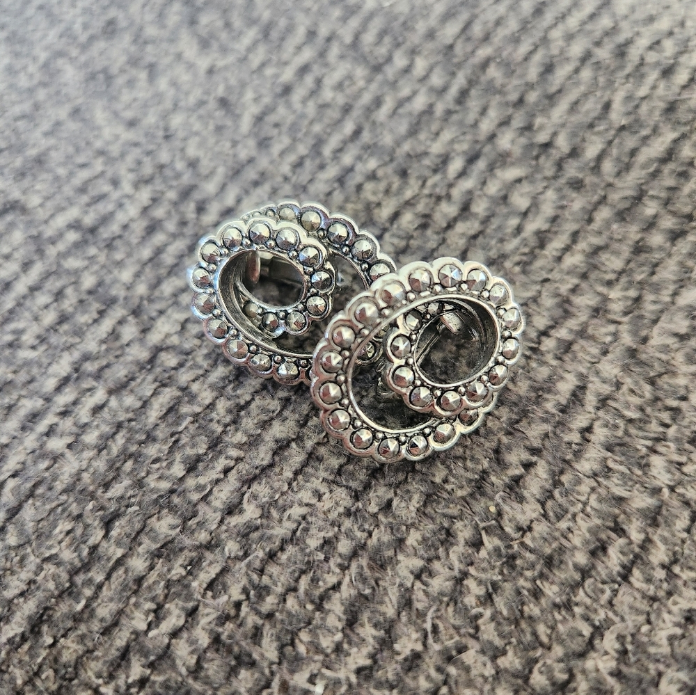 Avon Silver Swirl Clip-on Earrings